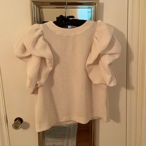 Cream ruffle sleeve top from Express